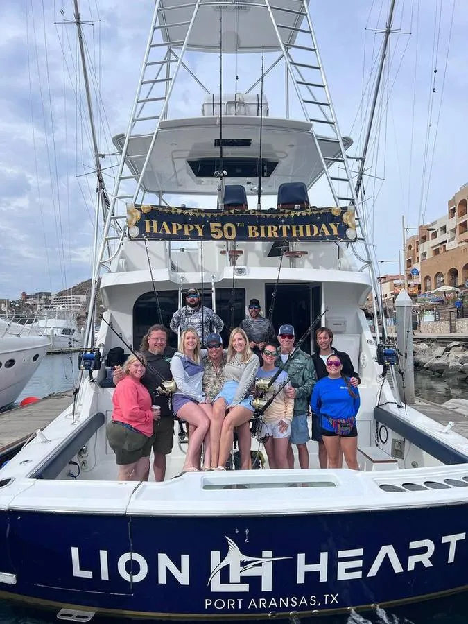 Happy 50th birthday celebration charter aboard Lion Heart sport fishing yacht Cabo San Lucas marina