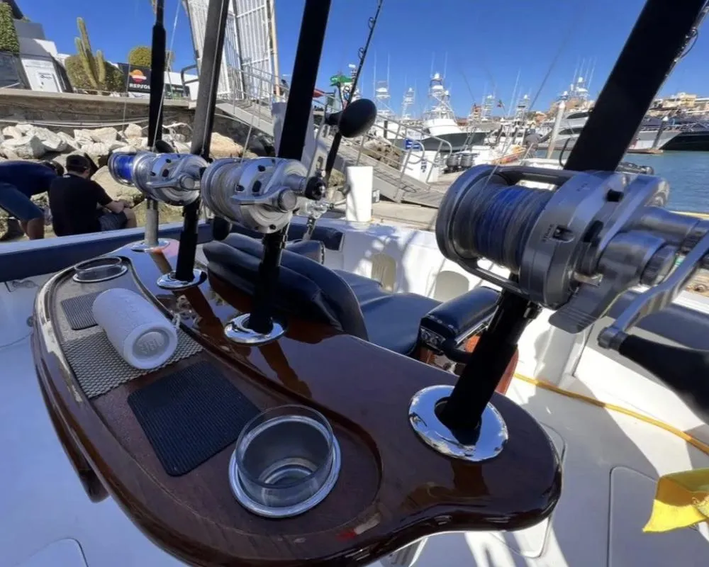 Shimano Tiagra and Stella reels on teak rod station aboard Lion Heart sport fishing yacht Cabo San Lucas